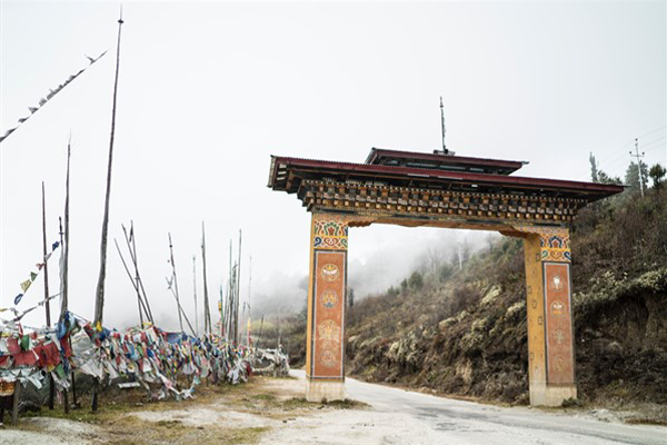 A Buddhist monument and prayer flags