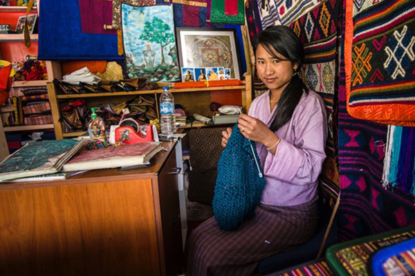 A young woman knitting